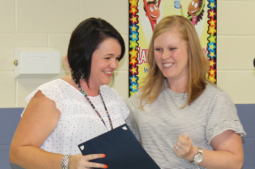 Christian Green receiving a certificate of recognition from Leann Bryan, Technology Coach Christian Green receiving a certificate of recognition from Leann Bryan, Technology Coach